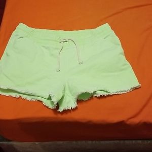 Neon green jean shorts large(11-13)